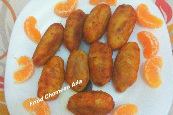 Fried Chemeen (Prawns) Ada or Fried Prawn masala stuffed rice dumplings