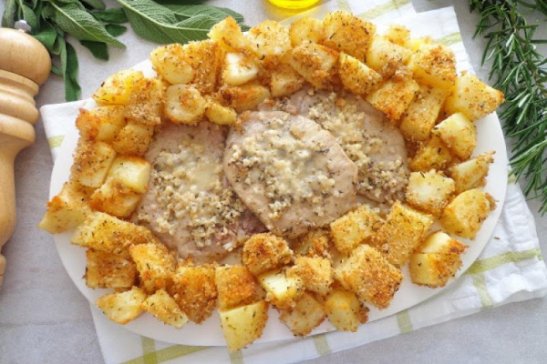 Kotlety schabowe w migdałach w białym winie i śmietanie (Braciole di maiale con mandorle a patate sabbiose)