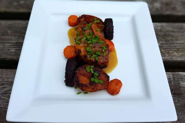 Roasted pork with black pudding and potatoes
