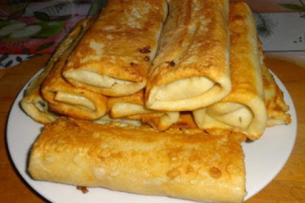 Krokiety z kiszoną kapustą i pieczarkami.