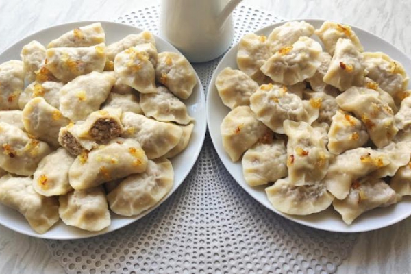 Pierogi z mięsem i kapustą kiszoną